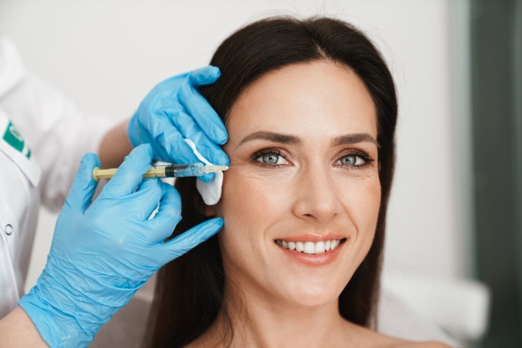 Young woman taking Botox Treatment in Luth And Heideman Center